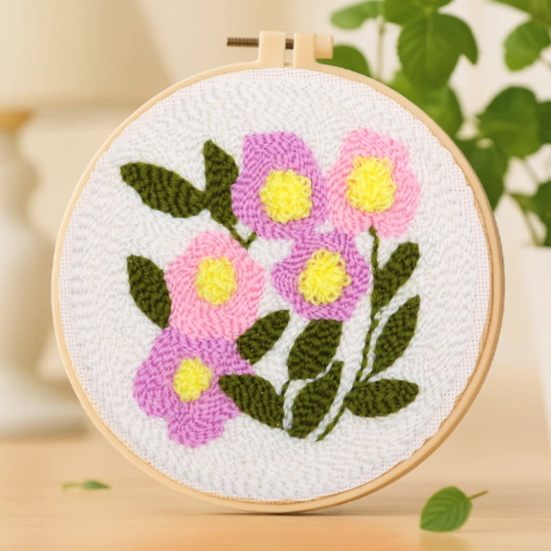 Soft pink and lilac blooms unfold gracefully against a pure white background, surrounded by lush green leaves. The gentle colors and smooth textures evoke the freshness of a spring garden — full of warmth, energy, and joy.