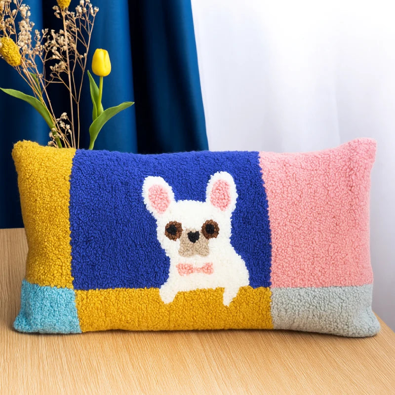 A puppy with a pink bow sits in the center against a colorful block background, simple yet full of playful charm