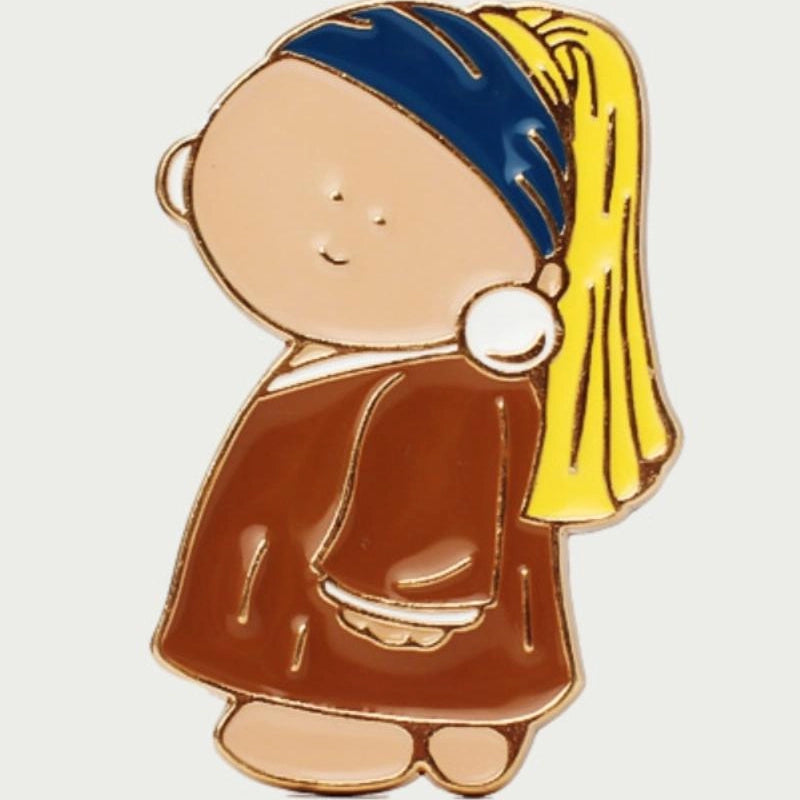 Pin with a cartoon character wearing a blue headband and yellow hair, holding a pearl earring.