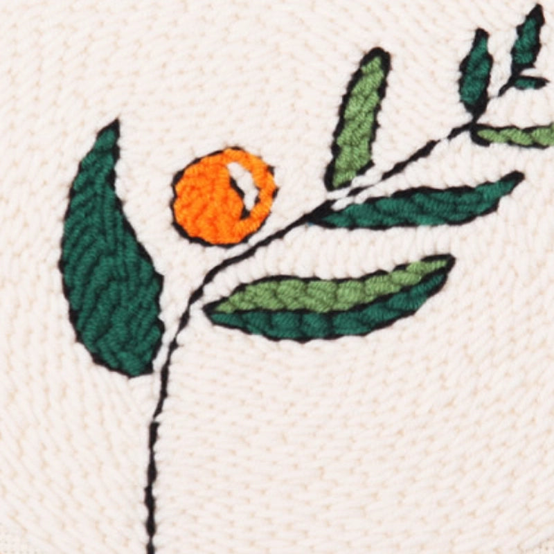 A single branch with green leaves and an orange fruit sways gently, as if dancing in the breeze.