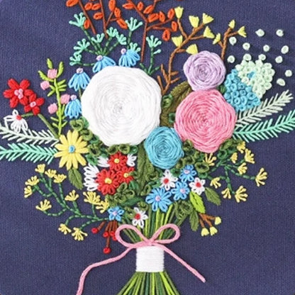 Colorful embroidered bouquet of flowers on a dark background