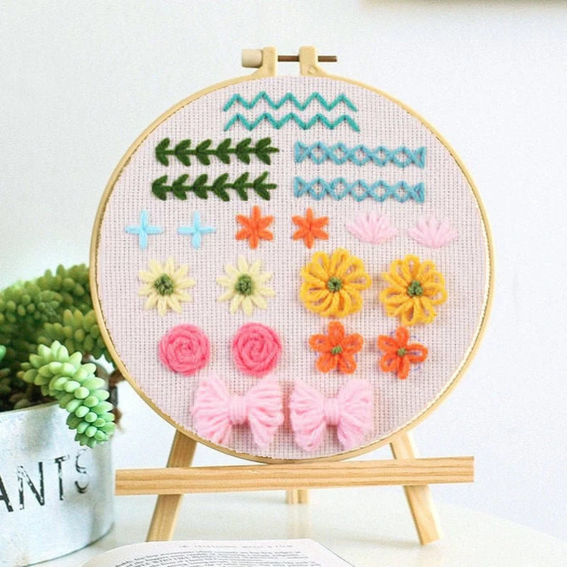 Combines wavy lines, small crosses, flowers, and bows in a variety of cheerful tones. A great way to master decorative stitches while creating charming and balanced designs.