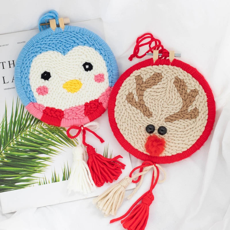 Two woven animal-themed coasters with tassels on a white surface.
