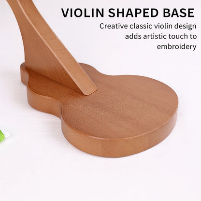 Violin-shaped wooden base for embroidery on a white background