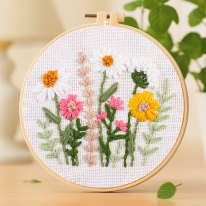 Inspired by the beauty of blooming meadows, this design features daisies, marigolds, and pink wildflowers arranged in a natural, carefree composition. The soft color palette and simple stitches make it a delightful project for both beginners and experienced crafters. Perfect for adding a touch of nature and warmth to your home décor.